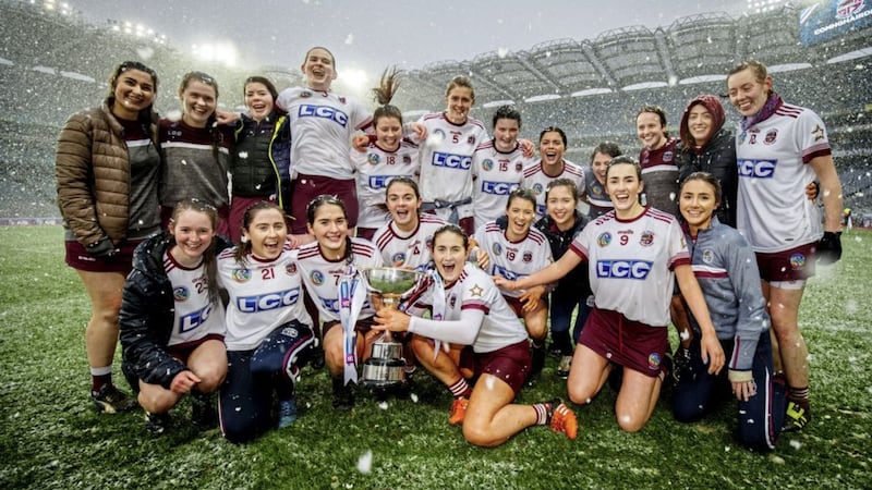 Slaughtneil camogs celebrate winning their third successive All-Ireland title. No amount of trips to America could match that sense of achievement 