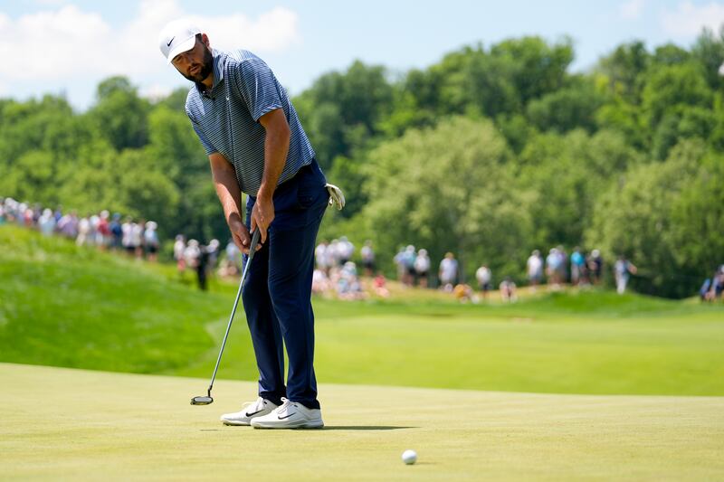 Scottie Scheffler reacts after missing a putt on the fourth hole during the final round of the US PGA Championship (Jeff Roberson/AP)