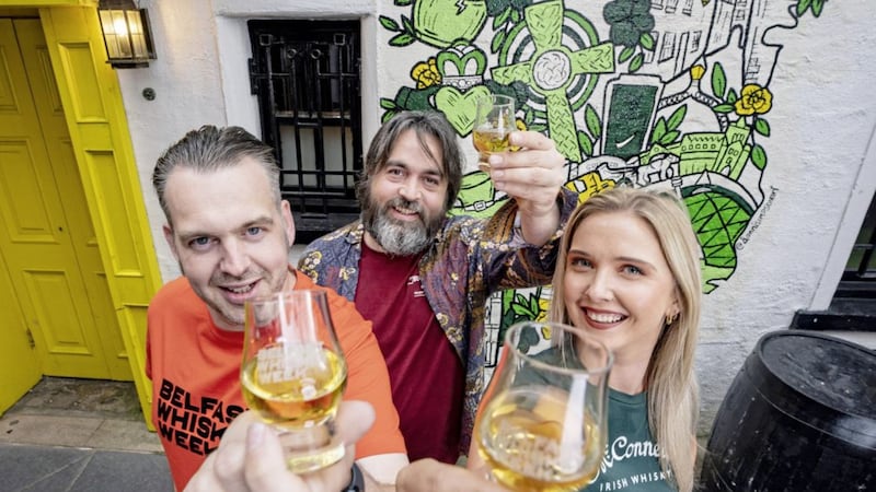 Preparing for Belfast Whiskey Week (L-R): Paul Kane, Belfast Whiskey Week; Conor Owens, Belfast Hidden Tours; and Sarah Kennedy, McConnell's Irish Whisky.