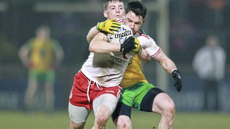 Tyrone Mattie Donnelly with Jamie Brennan of Donegal during the Allianz Football League match at Healy Park Omagh on March 10 2018. Picture Margaret McLaughlin.