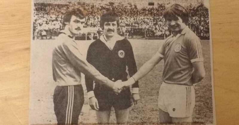 Liam Mac Laughlin shaking hands with Armagh captain Paddy Moriarty ahead of a 1979 Ulster SFC game&nbsp;