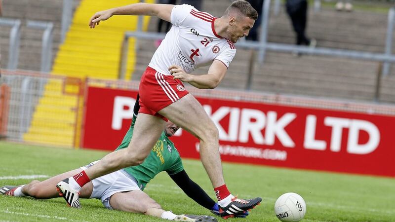 Tyrone&#39;s Brian Kennedy scores during the Ulster Senior Football Championship quarter-final between Tyrone and Cavan. A broadcast of the game was delayed on BBC Two due to coverage of Wimbledon. Picture by Philip Walsh 
