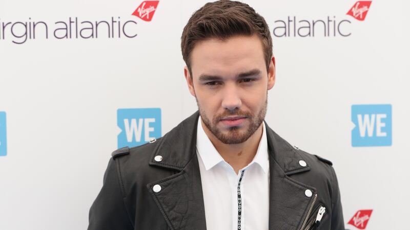 The former One Direction singer said he was threatened with a blade aged 12.