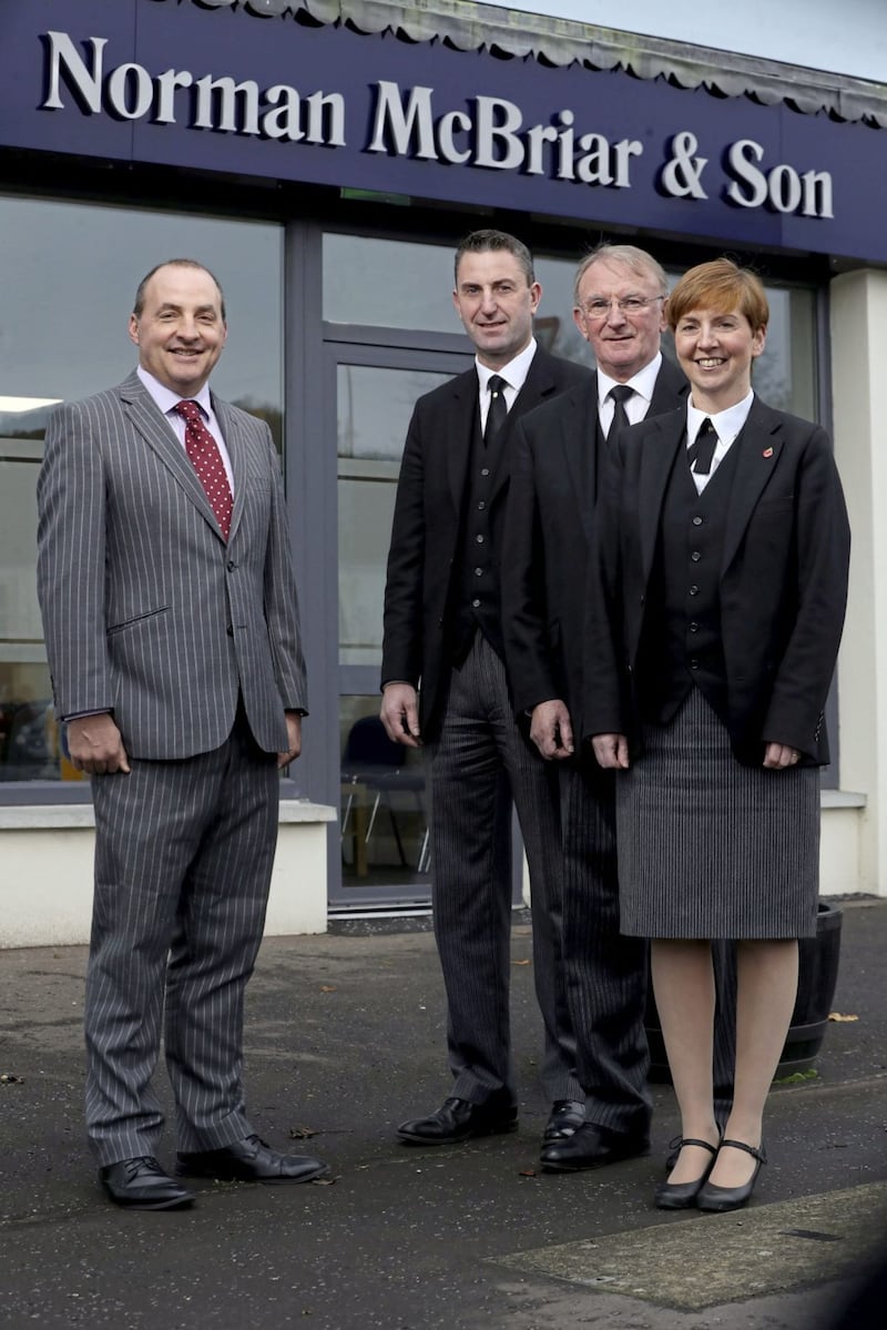 Derick Wilson, Business Development Manager at Ulster Bank, pictured with Norman McBriar and siblings Mark McBriar and Donna Spiers. 