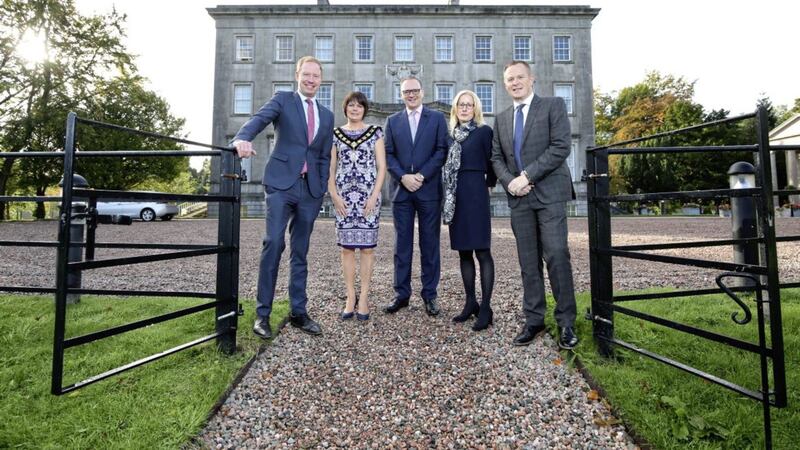 Pictured at the Archbishop&rsquo;s Palace in Armagh are Andrew Coggins, director at CBRE with Armagh City, Banbridge and Craigavon Borough Council mayor Julie Flaherty with the council&#39;s chief executive Roger Wilson and economic development and regeneration committee chair Paul Greenfield. Photo: Kelvin Boyes / Press Eye 