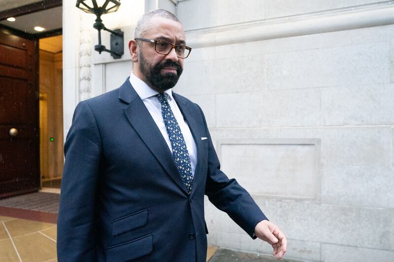 Home Secretary James Cleverly leaves the Millbank Studios in Westminster, central London.