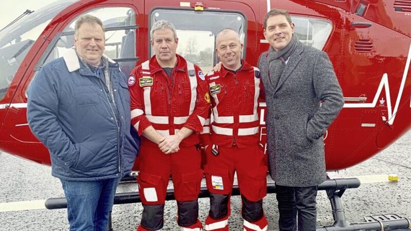 Andrew Trotter, owner of Trotter&rsquo;s Hardware Store in Dungannon, Dr Darren Monaghan, HEMS Clinical Lead, paramedic Glenn O&rsquo;Rorke, HEMS Operational Lead, and Malachi Cush 