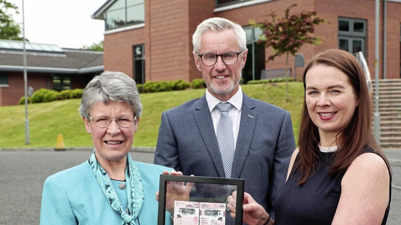  Terry Robb and Sandra Wright (right) of Ulster Bank presented Dame Jocelyn Bell Burnell (left) with the first of the new &pound;50 notes available in Northern Ireland. 