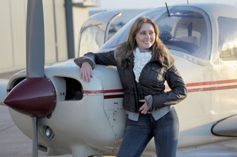 arol Vorderman at the Staverton Flying School at Gloucester Airport after passing her private pilot's licence (PPL) test.