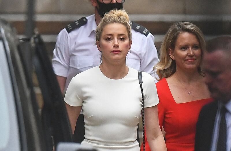 Actress Amber Heard leaves the High Court 