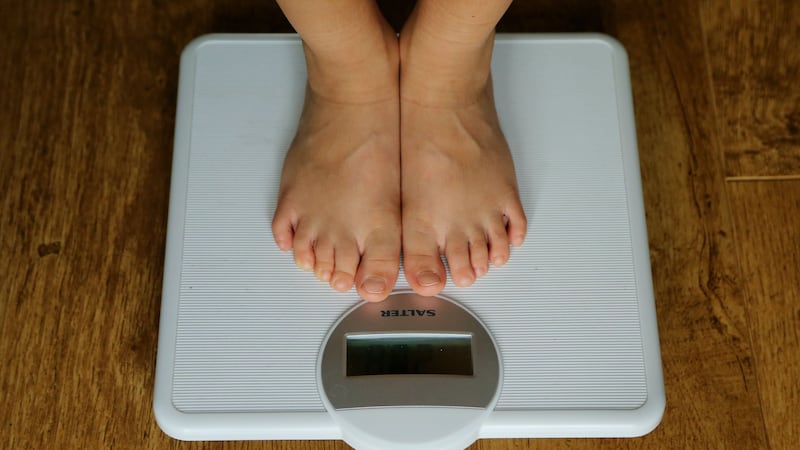 Lowering weight in adulthood could reduce the long-term adverse effects of childhood obesity, researchers say.