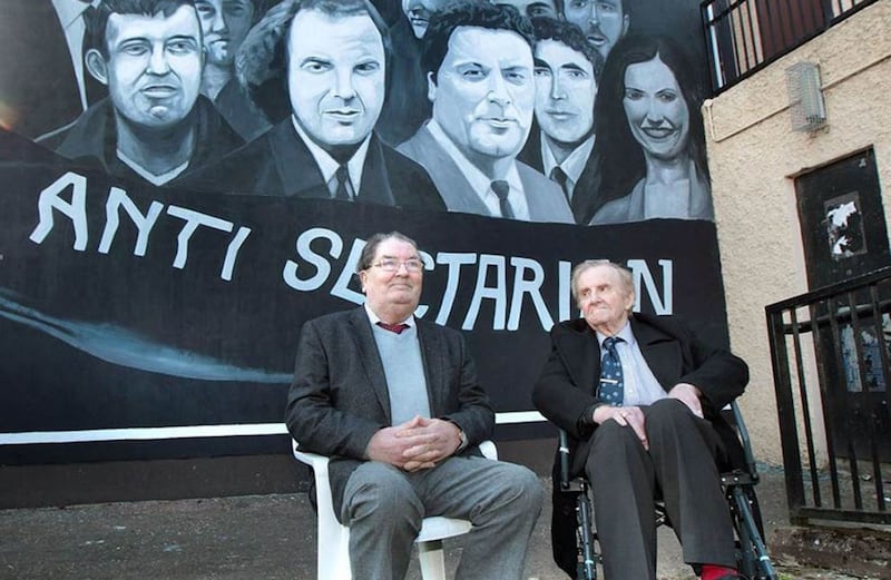 &nbsp;Ivan Cooper (right) and John Hume in front of a mural depicting a civil rights march. Picture by Margaret McLaughlin&nbsp;