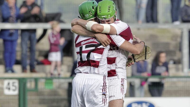 Slaughtneil captain Chrissy McKaigue and Michael Kearney celebrate on the final whistle after beating Banagher in last year&#39;s Derry Senior Hurling Championship final at Owenbeg. The sides meet again tomorrow Picture by Margaret McLaughlin 