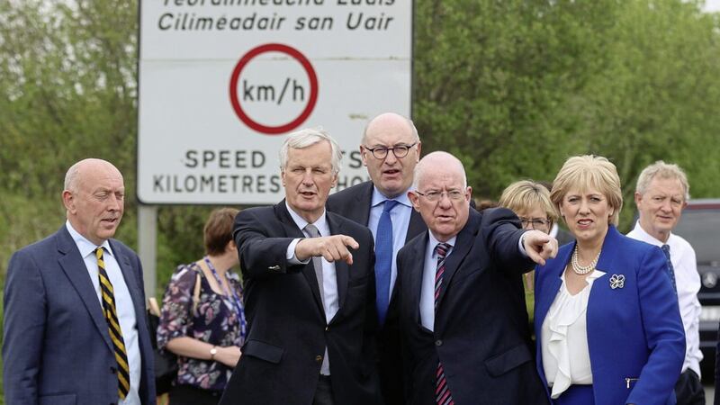 EU chief Brexit negotiator Michel Barnier (2nd left)  during his visit in May being shown the cross-border road linking Co Louth and Co Armagh. Picture by Liam McBurney/PA Wire 