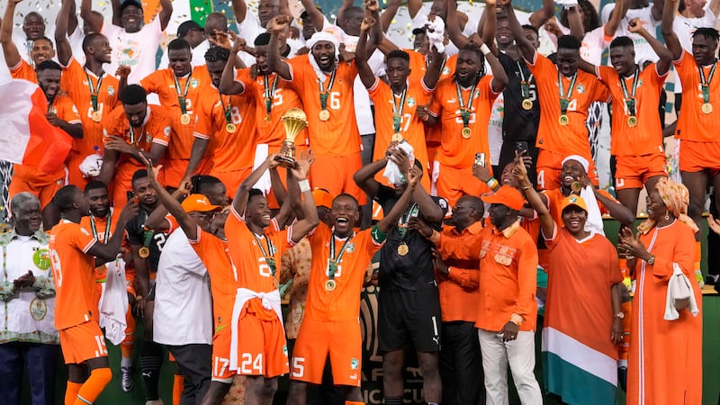 Ivory Coast players celebrate after winning the African Cup of Nations final against Nigeria (Sunday Alamba/AP).