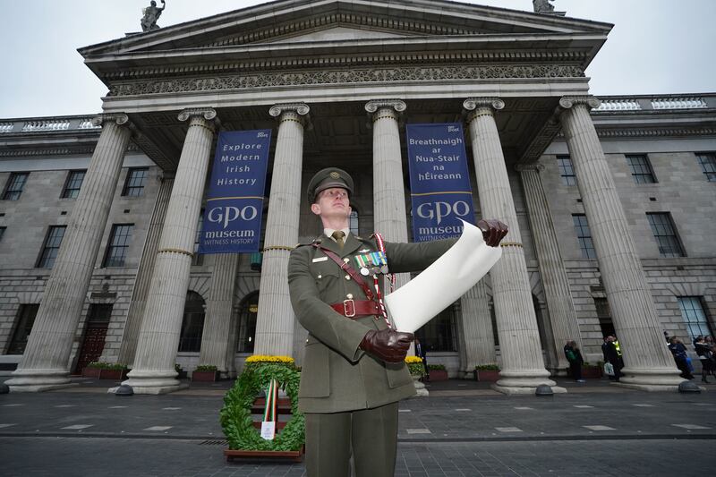 Commandant Daire Roache reads the proclamation of independence outside the GPO in Dublin, April 2022