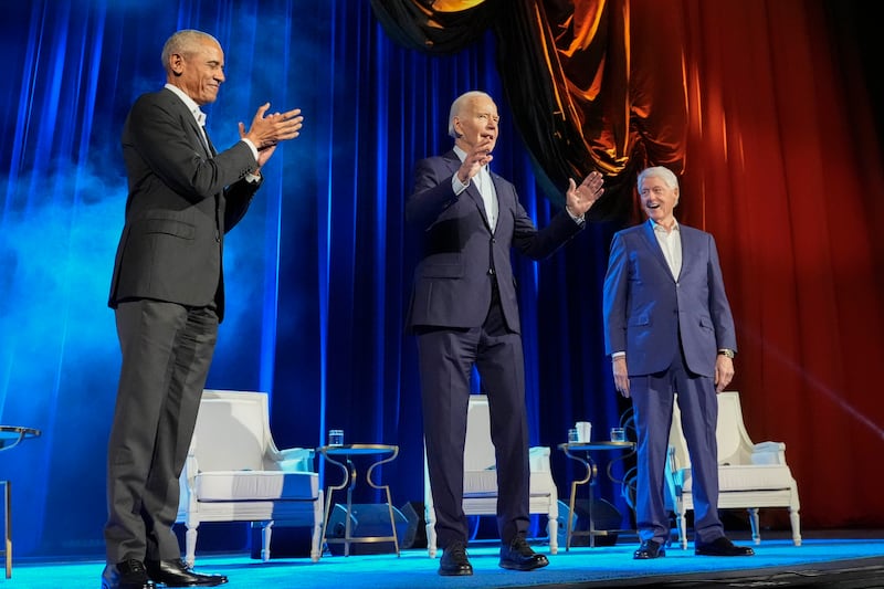 President Joe Biden and former presidents Barack Obama and Bill Clinton participate in a fundraising event at Radio City Music Hall on March 28 in New York (Alex Brandon/AP)