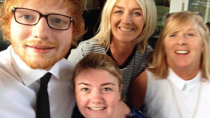 Ed Sheeran pictured with fans as he performed at the wedding of Johnny McDaid's sister Brid in Derry. Picture by Beech Hill Country House Hotel&nbsp;