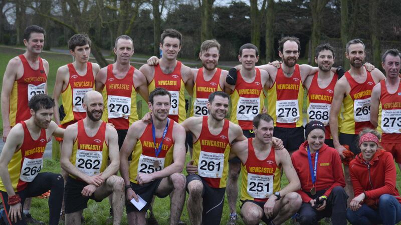 The whole Newcastle team celebrate a successful day at the&nbsp;Northern Ireland &amp; Ulster Senior Cross Country Championships at Lurgan Park