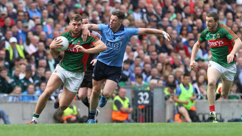 Dublin's Philly McMahon up against Mayo's Aidan O'Shea during last year's All-Ireland Senior Football Championship semi-final at Croke Park<br />Picture by Colm O'Reilly