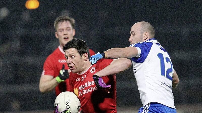Tyrone's Sean Cavanagh steals a march on Monaghan's Gavin Doogan during yesterday's Allianz Football League Division One clash at Healy Park <br />Picture by Philip Walsh