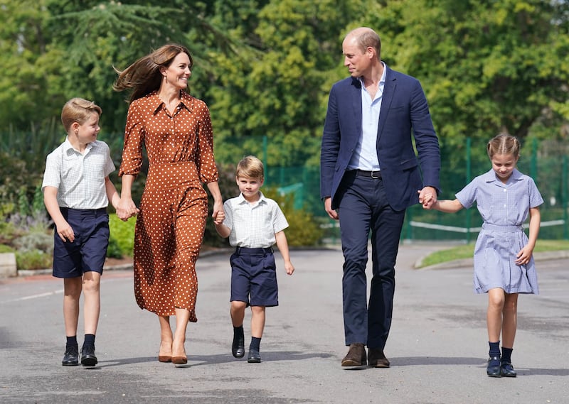 The Prince and Princess of Wales with their children, Prince George, Princess Charlotte and Prince Louis, on their first day at Lambrook School in September 2022