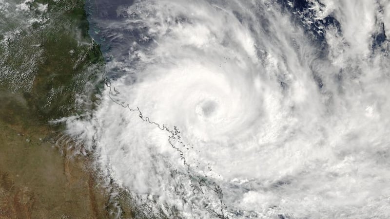 The Category 4 storm packing winds up to 160mph has slammed into a resort town in Queensland.