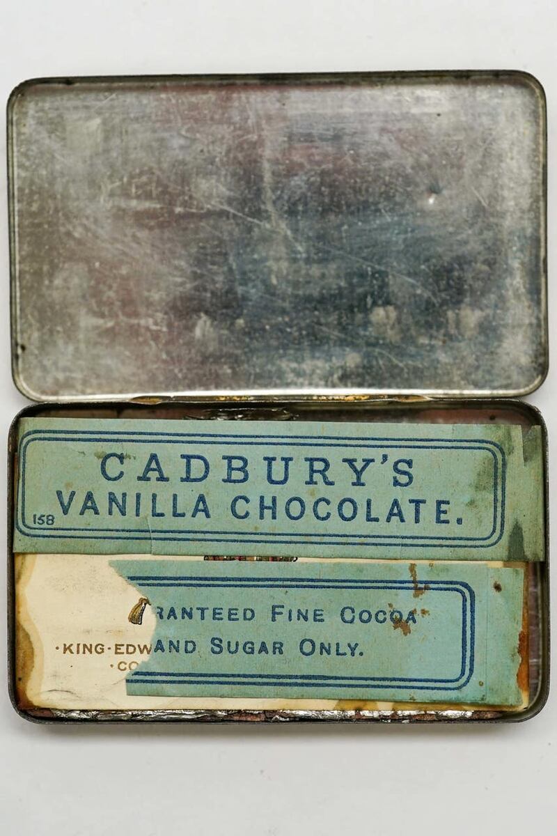 A tin containing Cadbury chocolates made to celebrate the coronation of King Edward VII and Queen Alexandra