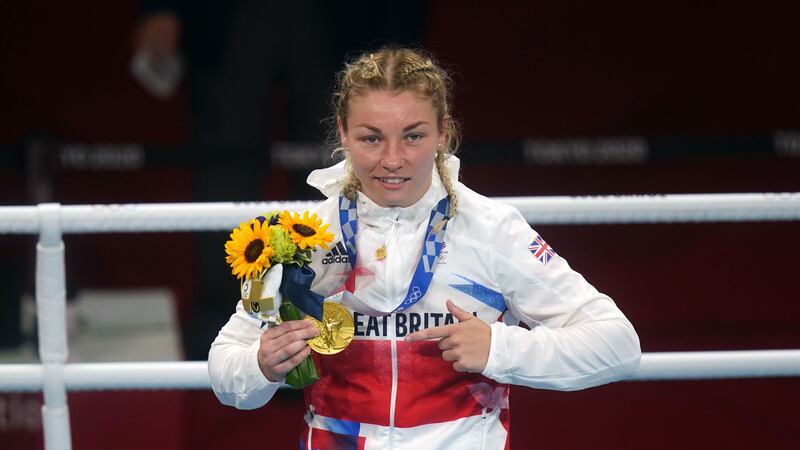 The gold-medal winning Welshwoman drove a cab at weekends after deciding to drop her football career to seek glory in the ring.