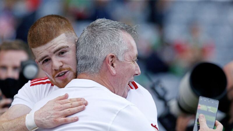 Tyrone's Cathal McShane celebrates with Tyrone Pro Eugene McConnell after winning the All-Ireland SFC Final. <br />Pic Philip Walsh