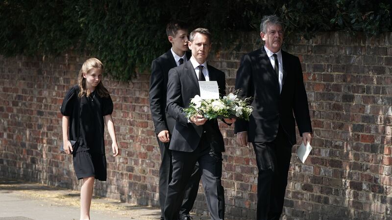 Members of her family carried flowers and a picture of the cancer campaigner into the church in west London.