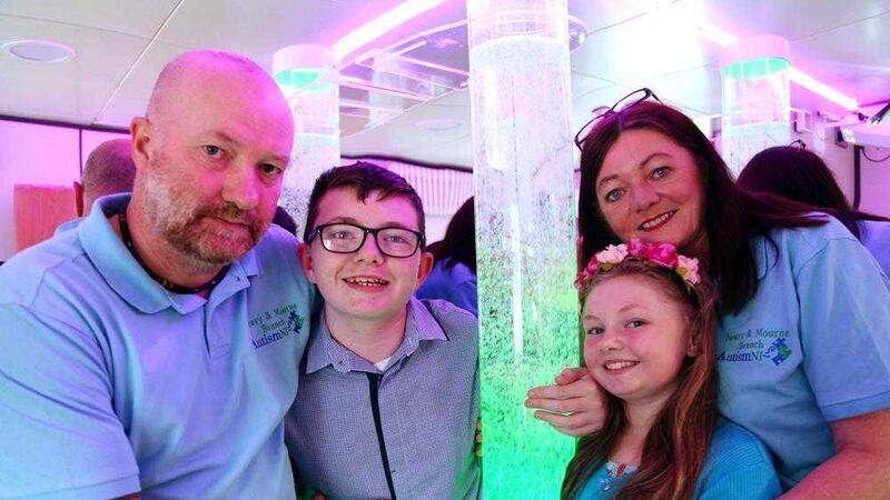 Davey and Deidre McLean of Autism NI Newry and Mourne with 11-year-old Dylan and his sister Orla Mai, aged nine, in the new autism-friendly facility 