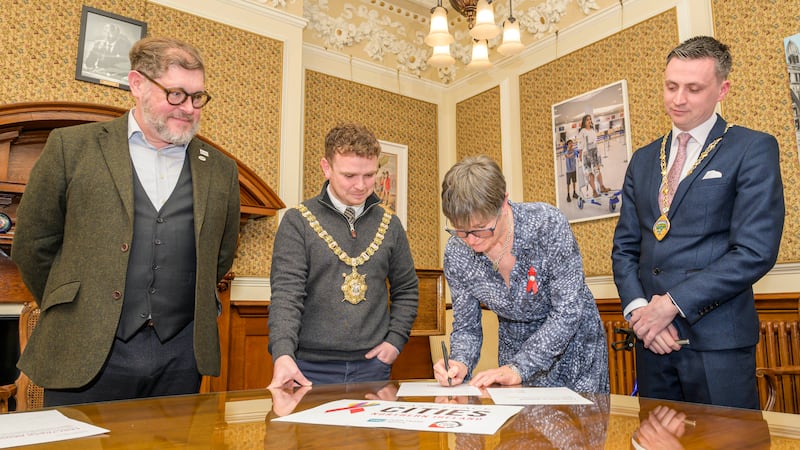 Pictured at Tuesday's signing of the Paris Declaration are, left to right, Bertrand Audoin of Fast Track Cities Paris, Lord Mayor of Belfast Ryan Murphy, Positive Life CEO Jacquie Richardson and Deputy Mayor of Derry City and Strabane, Jason Barr.