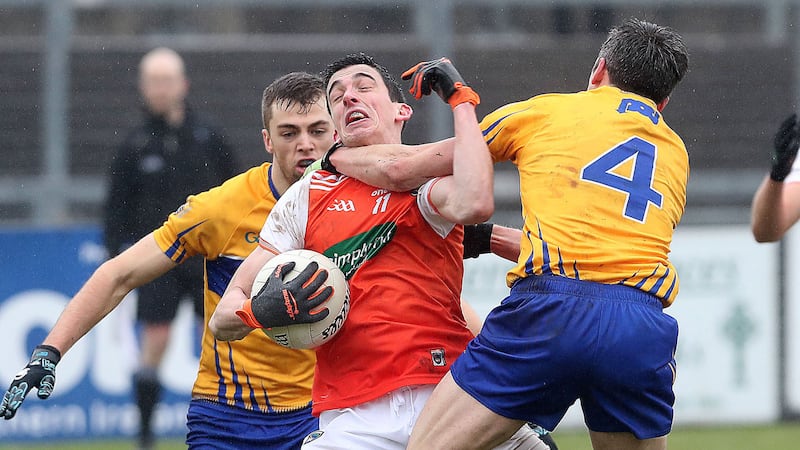 Armagh's Rory Grugan is halted by Clare's Gordon Kelly  in the Allianz National Football League Division Two clash at Pairc Esler, Newry. Picture by Bill Smyth<br />.&nbsp;