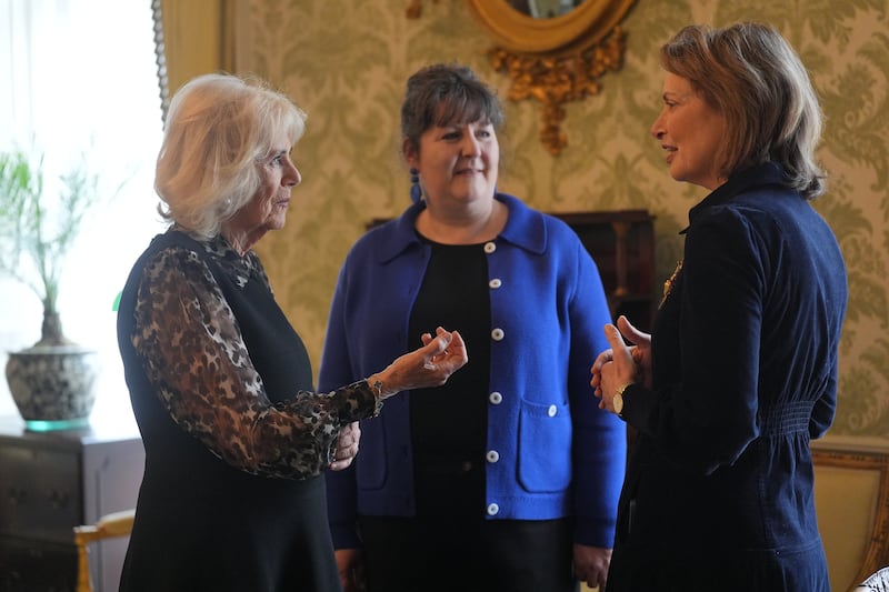 Queen Camilla with SafeLives chief executive Ellen Miller and chair of trustees Isabel Boyer