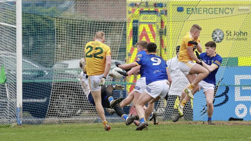Antrim's Marc Jordan (22) fires in the Saffrons' opening goal in the Division Three win over Wicklow at Corrigan Park. <br />Pic by John McIlwaine