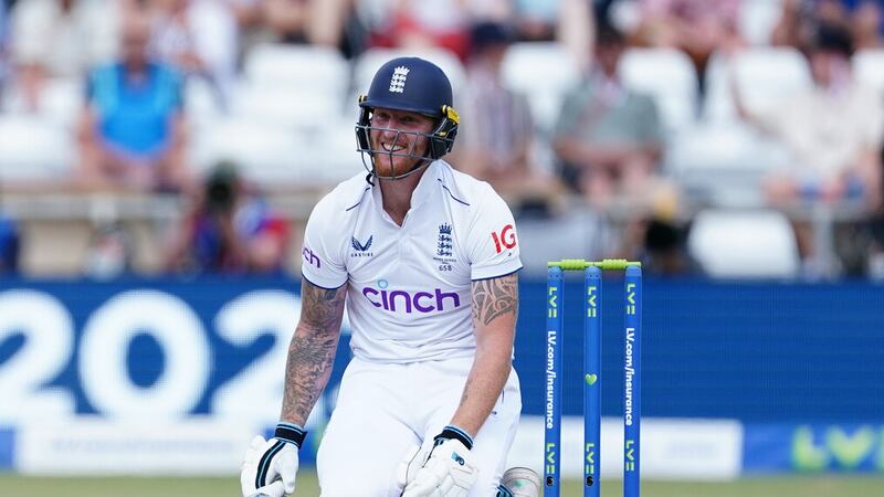 Ben Stokes smiles after taking a blow from an Aussie bowler during his innings of 80 in the third Test against Australia at Headingley