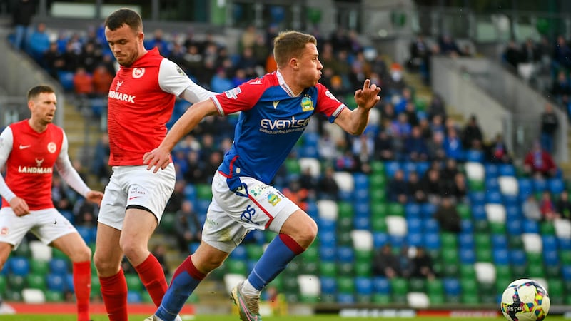 PACEMAKER PRESS BELFAST 22-04-24
Sports Direct Premiership
Linfield v Larne
Kyle McClean of Linfield tackles Chris Gallagher of Larne during this Evening’s game at NFS @ Windsor Park Belfast.  
Photo - Andrew McCarroll/ Pacemaker Press