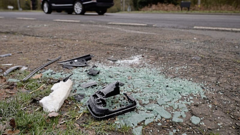 Broken glass and car parts on the side of the A149 near to the Sandringham Estate where the Duke of Edinburgh, inset, was involved in a road crash 					 	  Picture: John Stillwell/PA
