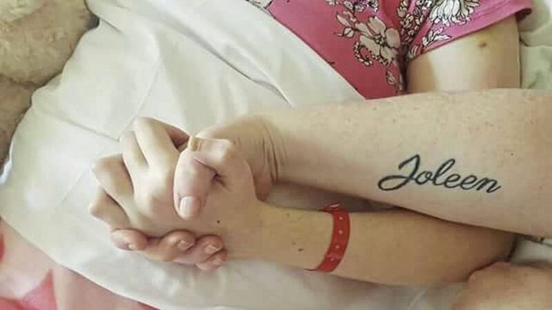 The last picture of Joleen Corr, holding her mother Carol&#39;s hand 
