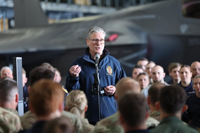 Prime Minister Sir Keir Starmer speaks to the crew of HMS Prince of Wales, the Royal Navy’s flagship aircraft carrier, in front of a F35 fighter aircraft in the hangar of the carrier in Plymouth, Devon, ahead of an eight-month deployment to the Indo-Pacific region on Operation Highmast