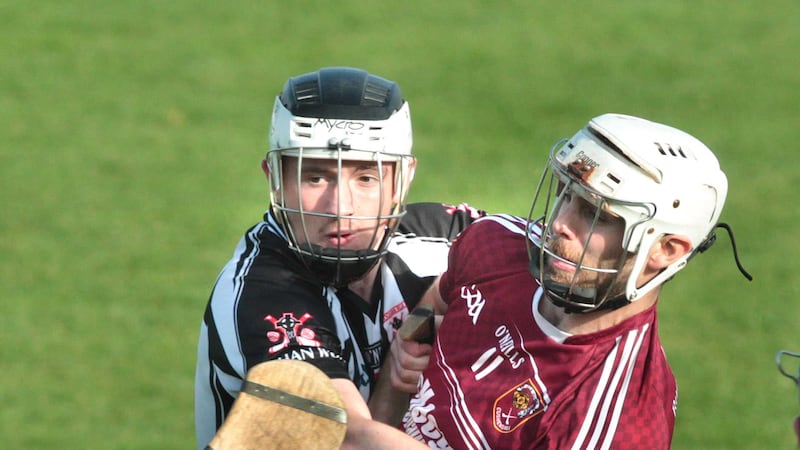 Ruair&iacute; &Oacute;g's Neil McManus tangles with Tiernan Nevin of Middletown during Sunday's Ulster Club Senior Hurling Championship semi-final match at Owenbeg Picture: Margaret McLaughlin&nbsp;