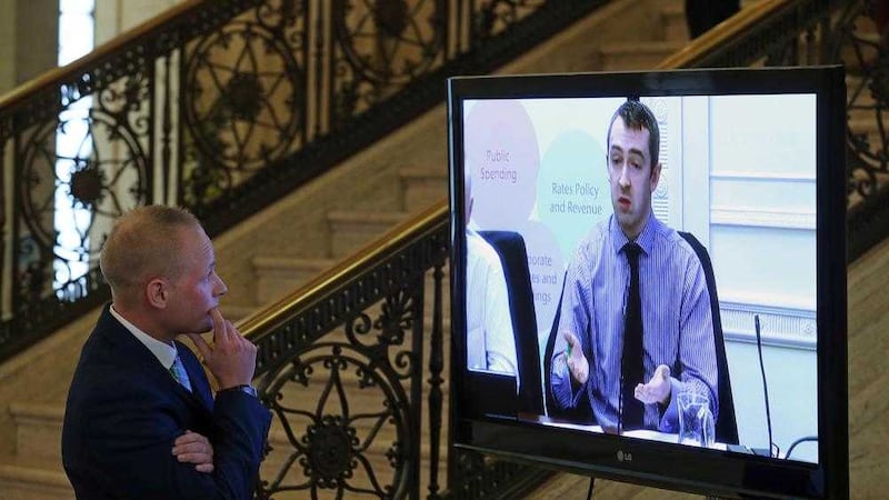 Jamie Bryson watches Sinn F&eacute;in MLA Daith&iacute;&shy; McKay and former chair of the Finance Committee in the Great Hall in Stormont before he appeared at the Nama inquiry in September 2015. Picture by Mal McCann