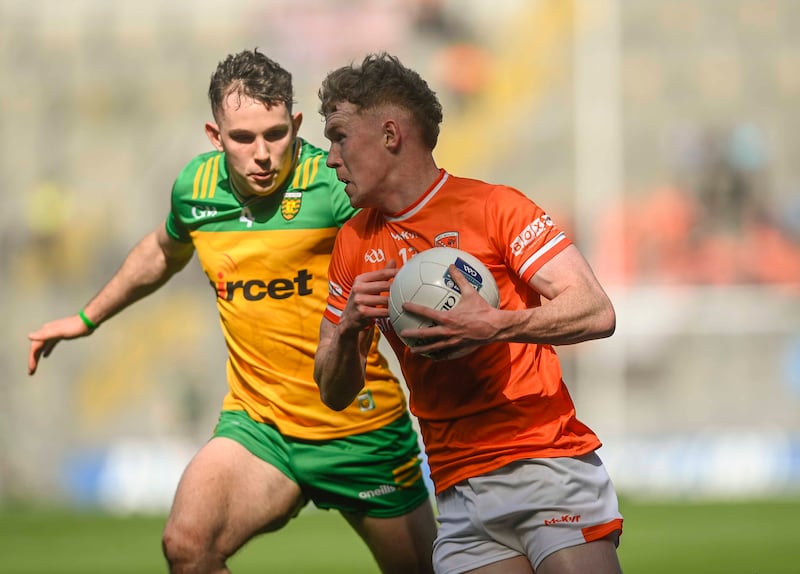 Donegal defender Caolan McColgan closes down Conor Turbitt as Armagh go on the attack. Picture Mark Marlow