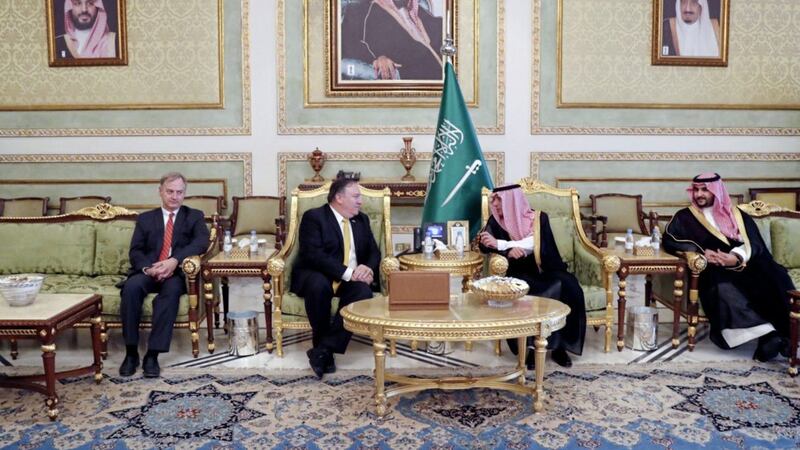 US secretary of state Mike Pompeo, centre left, talks with Saudi foreign minister Adel al-Jubeir after arriving in Riyadh. Picture by Leah Millis/Pool via AP 