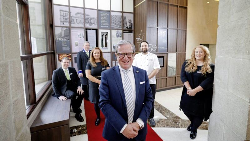 James McGinn, General Manager of the Europa Hotel, is joined by colleagues Callum Dickson, Martin Mulholland, Lynsey Monaghan, Kyle Greer and Aine Finnegan as the world-famous hotel unveils a permanent lobby installation to celebrate its 50th birthday. Picture by Philip Magowan/PressEye 