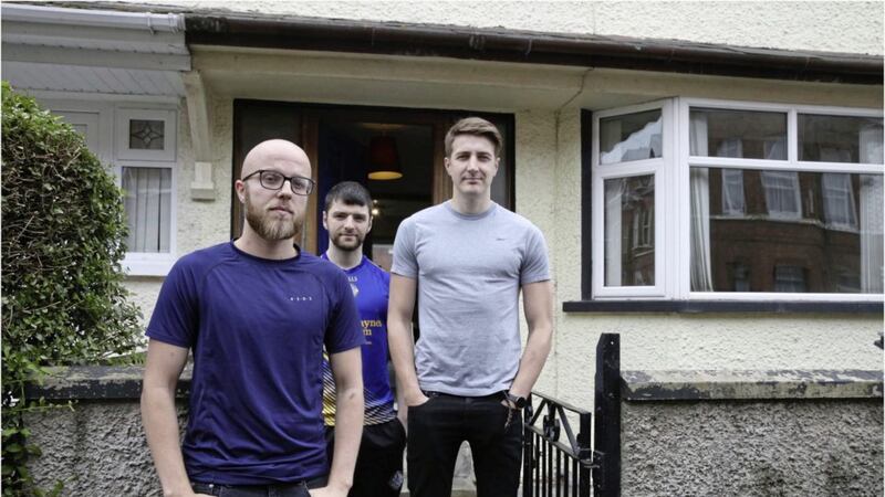 David Sturdy (left), Jack McMullan and Adam Gallagher, fourth year medical students, whose home on Dunluce Avenue in south Belfast was targeted in a burglary. Picture: Hugh Russell 