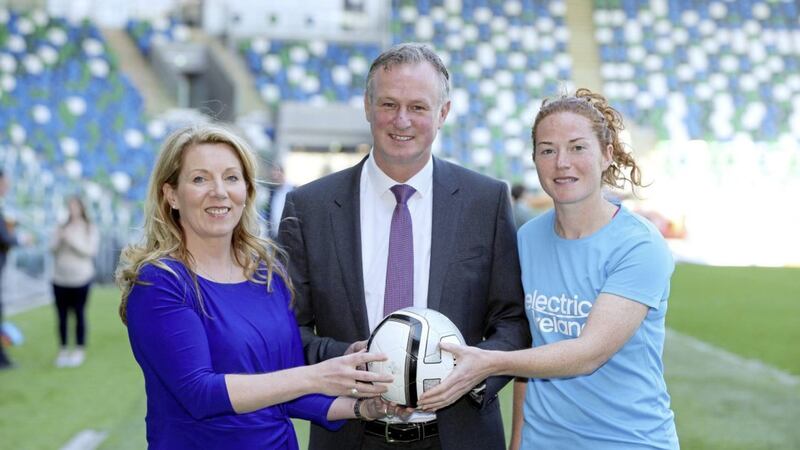 Electric Ireland unveiled as lead sponsor of Women&rsquo;s Grassroots Football. Pictured are Clare McAllister , Sales and Marketing Manager of Electric Ireland, Northern Ireland International Manager Michael O&rsquo;Neill and Marissa Callaghan Captain of the Northern Ireland Women&rsquo;s Senior Team. 
