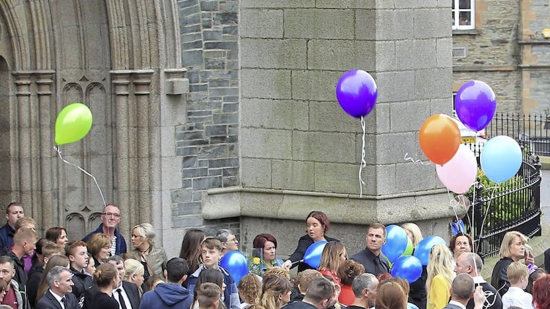 Classmates of six-year-old Donnacadh Maguire release balloons at his funeral at St Eugene&#39;s Cathedral in Derry on Saturday. Picture by Margaret McLaughlin 