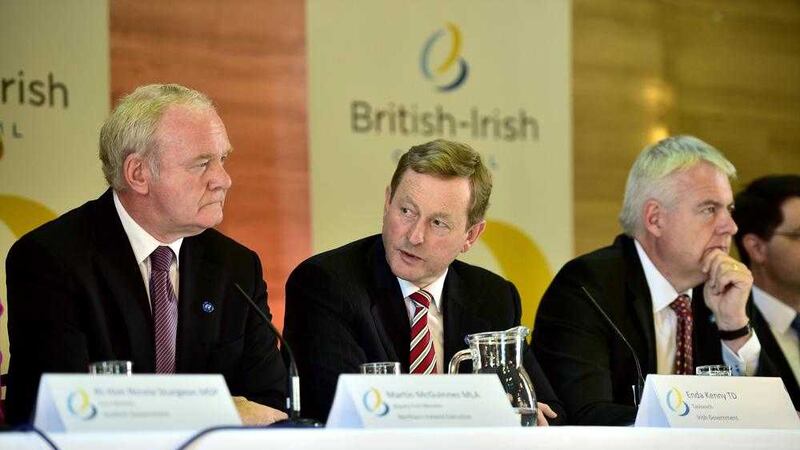 Taoiseach Enda Kenny, centre, with Deputy First Minister Martin McGuinness, left, and Wales First Minister Carwyn Jones at the Temple of Peace, Cardiff. Picture by Ben Birchall, Press Association 